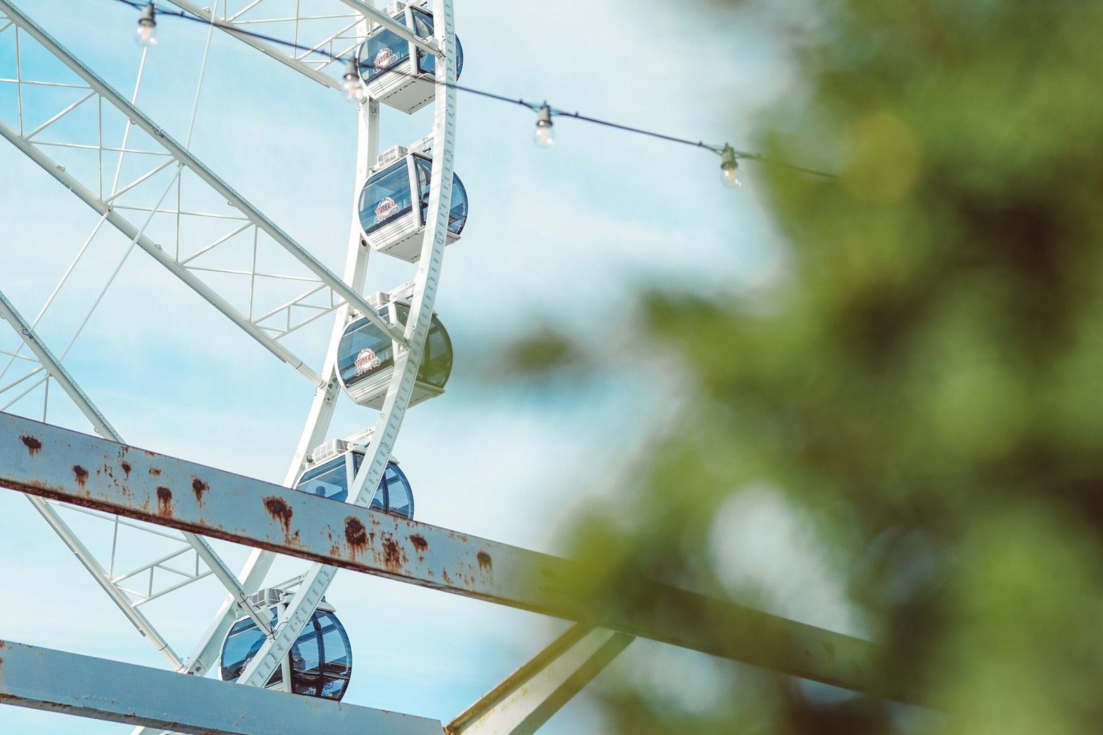 a ferris wheel with a blue sky in the background