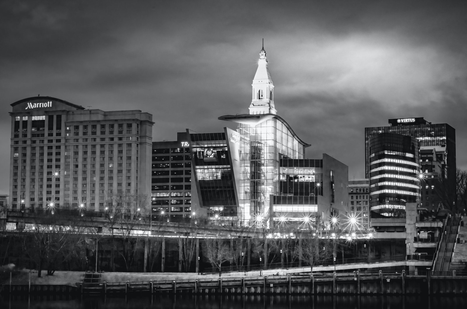 grayscale photo of city buildings