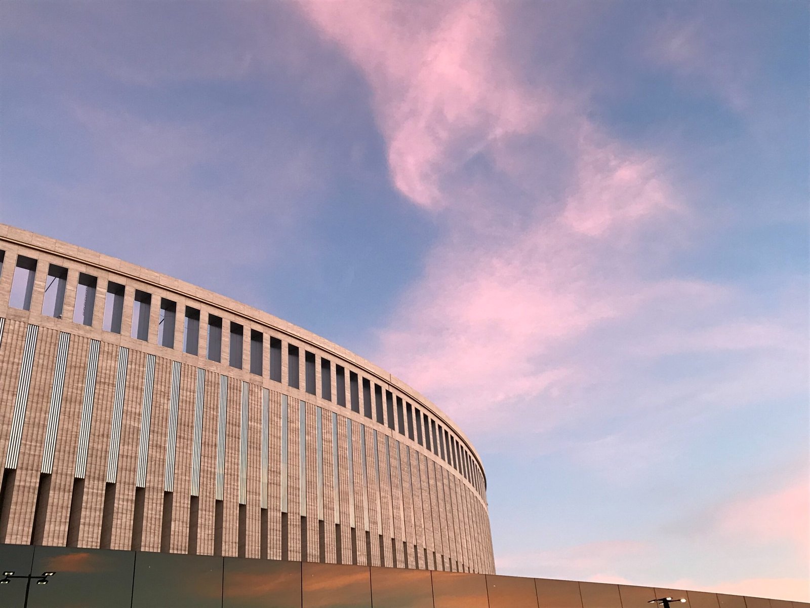 low-angle photography of gray concrete building during daytime